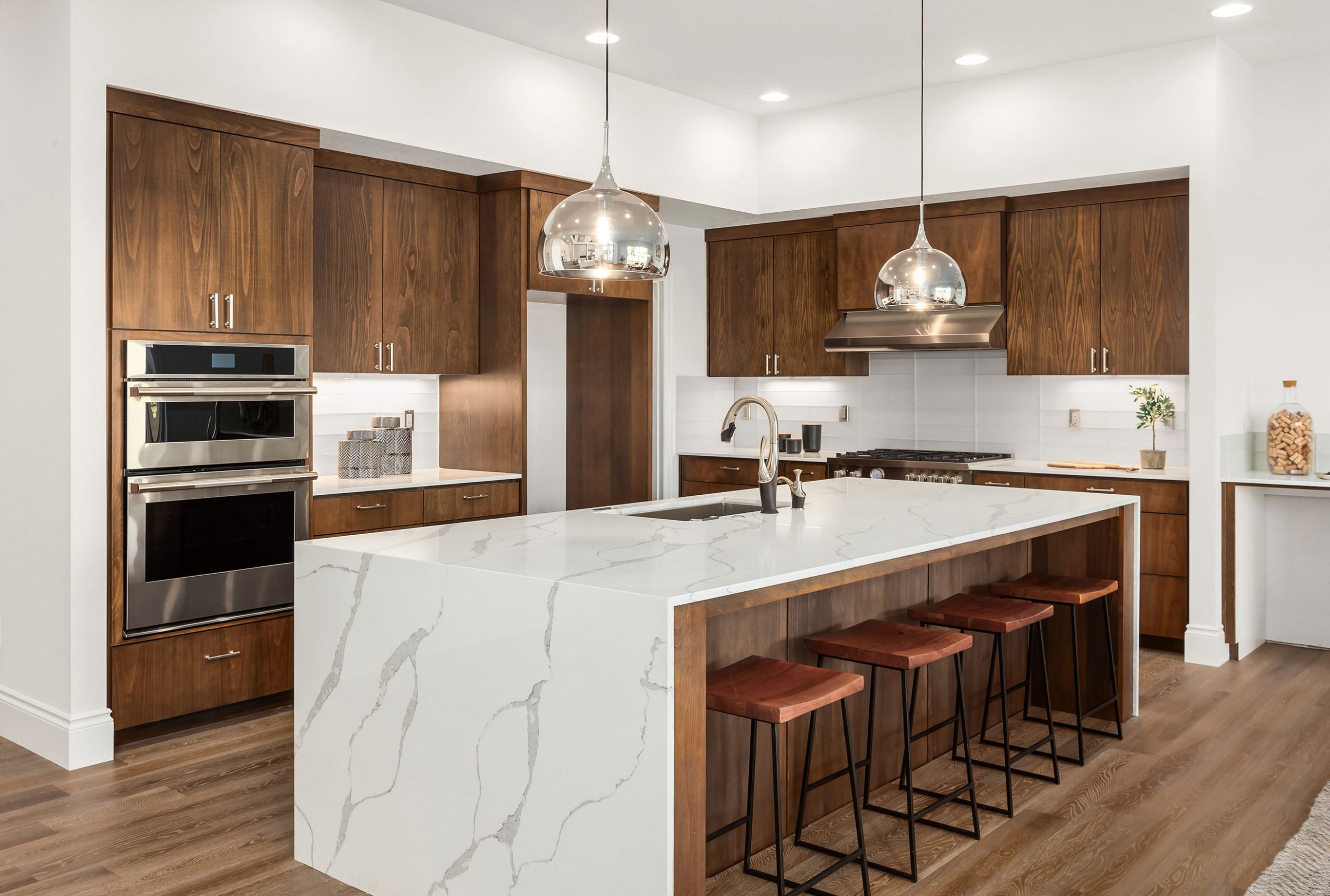 Elegant kitchen with granite countertops and dark wooden cabinets