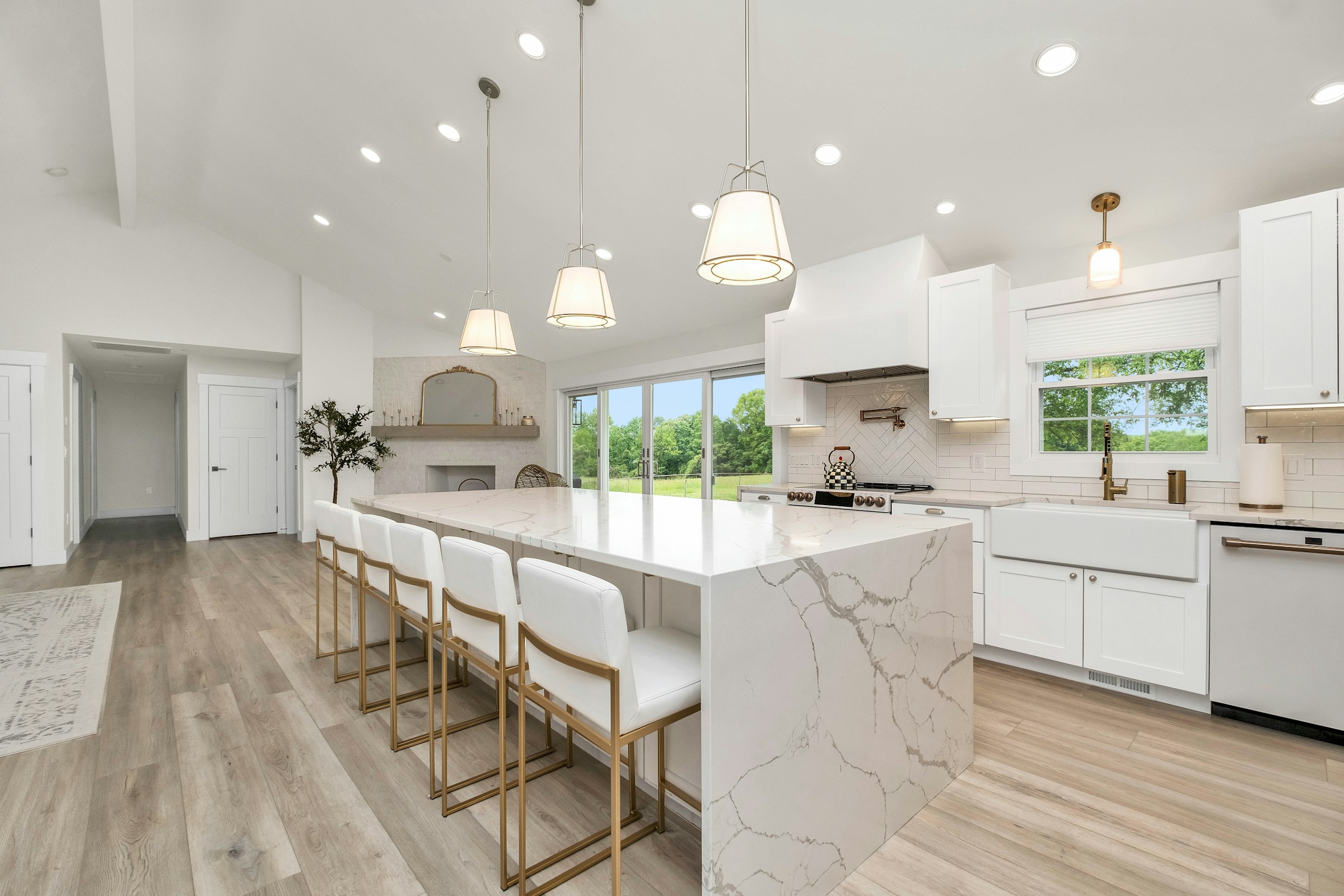 White kitchen with white kitchen island countertops and new cabinets
