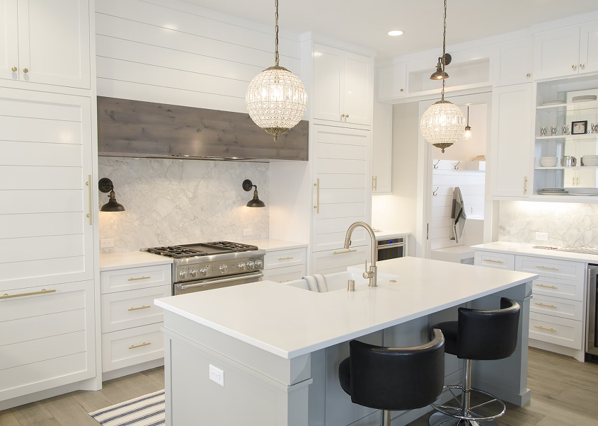 Modern kitchen with white countertops and cabinets
