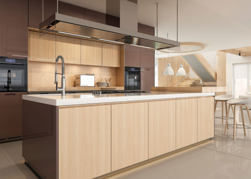 Modern kitchen with light wood cabinets and white countertops